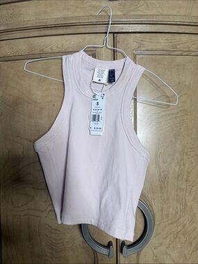 Adidas W LNG RIB TOP women's ribbed tank top in putty mauve.